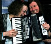 Two-handed accordion playing
